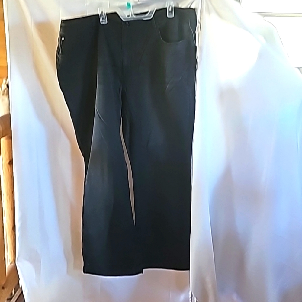 Diane Gilman,  Black stretch jeans. Distressed black. Size 26WT.